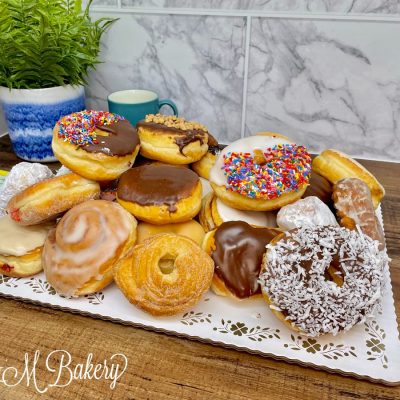 Donut board on a wooden table.